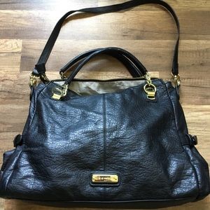 Steve Madden Black purse with detachable strap.